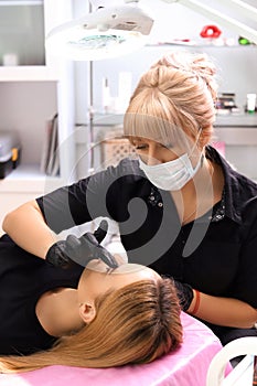 Permanent make up on eyebrows.