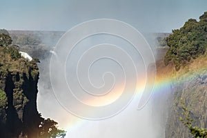 Permanent rainbow at Victoria Falls. Zimbabwe.