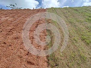 Permanent slope protection using the close turfing method to prevent erosion.