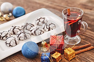 Perparing traditional cookies and gluhwein or mulled wine for new year celebration