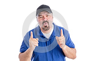 Perplexed man pointing upwards