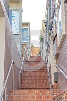 Perron staircase with bricks and metal handrailing at San Francisco, California