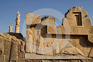 Persepolis is the capital of the Achaemenid kingdom. sight of Iran. Ancient Persia. Bas-relief on the walls of old buildings