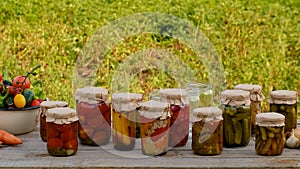 Perseveration of vegetables in jars. Selective focus.