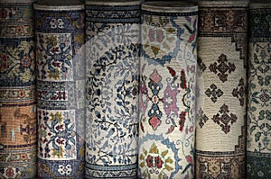 Persian carpets folded in rolls in Tunisia