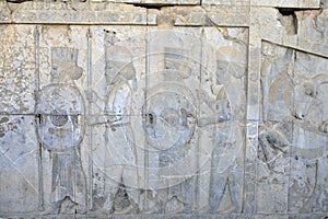 Persian warriors armed, bas relief in Xerxes palace, Persepolis, Iran.