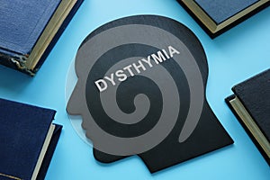Persistent depressive disorder PDD dysthymia written on a head shape