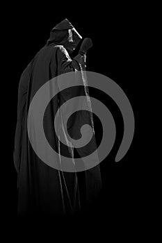 Person in black cloak.