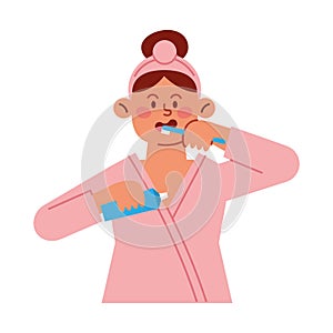 person brushing teeth with bathrobe