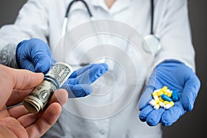 A person buys pills from a doctor