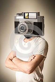 Person with camera in place of head