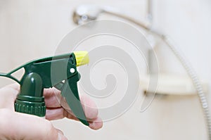 Person cleaning shower