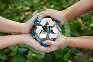 Person collects recyclables, advocating for sustainability and environmental responsibility