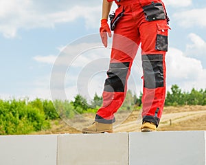 Person on construction site wearing workwear