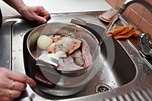 Person cooking of meat aspic