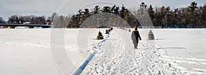 Person crossing a frozen river