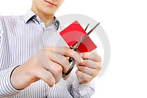 Person cutting a Credit Card