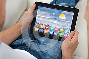 Person With Digital Tablet Showing Apps