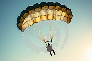 A person doing parachuting in the sky