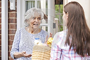 Person Doing Shopping For Elderly Neighbour photo