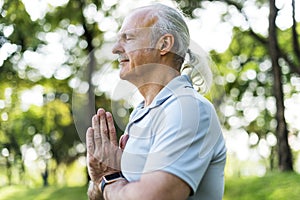 Person doing yoga at the park