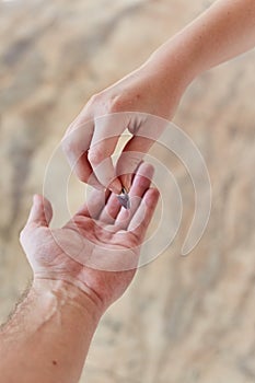 A person a donates money to beggar