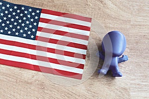 person figurine. man with USA flag photo