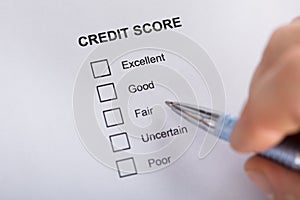 Person Filling Credit Score Form