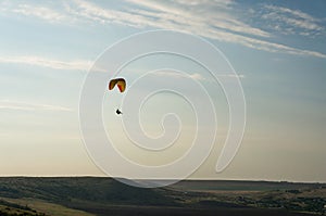 person flying on paraplane sky with clouds on background Ukraine Crimea