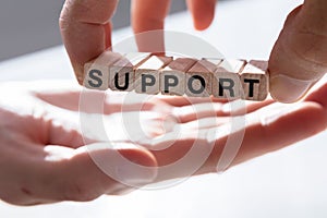 Person Giving Support To Other Person