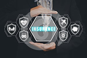 Person hand holding with VR screen Insurance icon background on desk