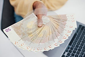 Person, hand and money fan in financial freedom, salary or payment for investment, growth or profit at office. Closeup