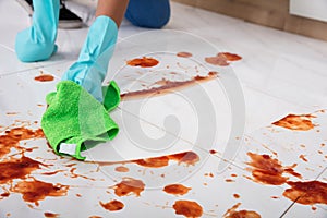 Person Hand Wearing Gloves Cleaning Floor