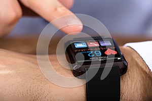 Person Hand Wearing Smart Watch
