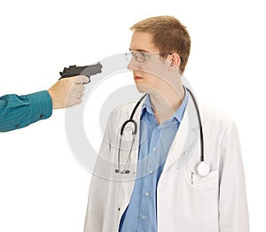 Person hold young doctor at gunpoint photo