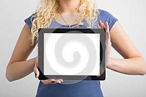 Person holding blank screen tablet in hands
