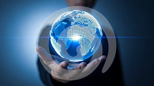 Person holding a digital globe in hands