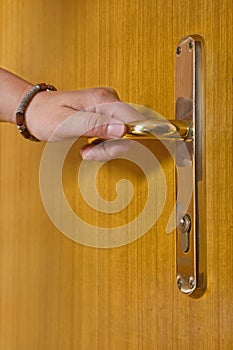 Person holding door handle