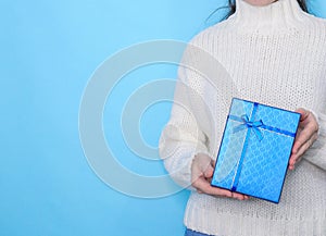 Person holding gift box