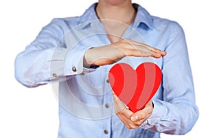 Person holding a heart