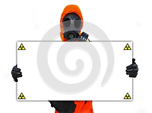 Person holding nuclear hazard sign