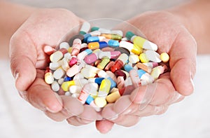Person holding pharmaceuticals photo