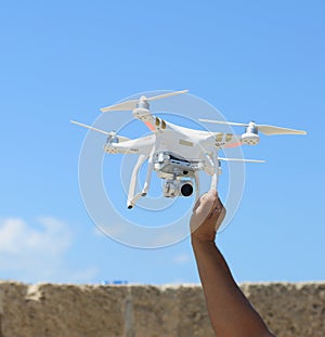 Person holding quadcopter