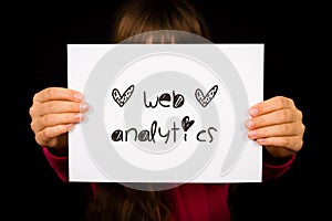 Person holding web analytics sign