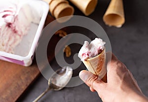 Person with Ice cream cornet in hand