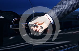 Person Inserting Car Key