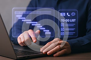 Person Using Laptop with Digital Gantt Chart and To Do List for Project Management