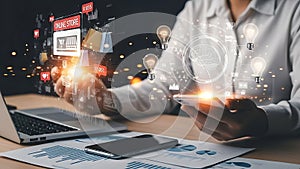 Person using smartphone and laptop with glowing digital elements and data visualization