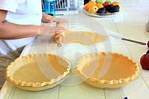 Person kneading a Pie Crust for an Apple pie