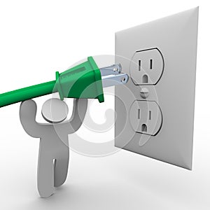 Person Lifting Power Plug to Electrical Outlet photo